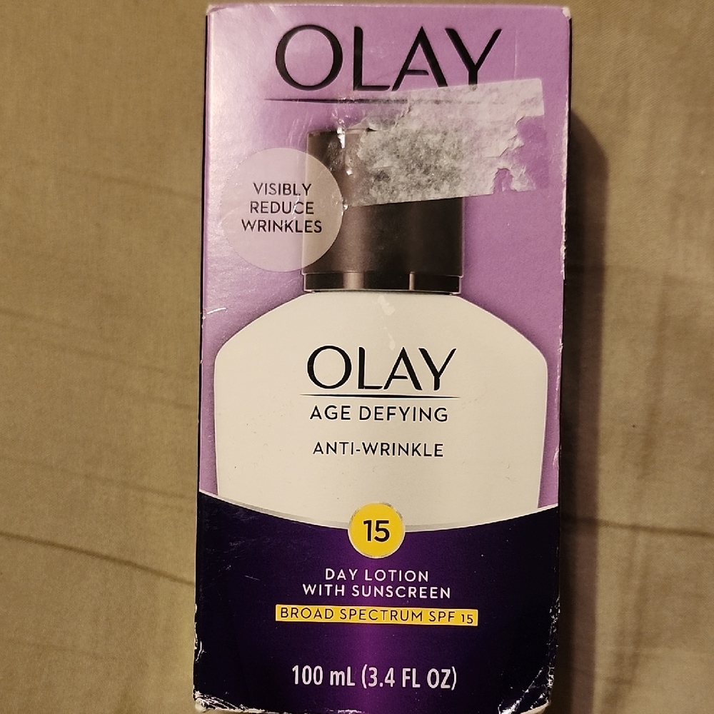 OLAY Age Defying Anti-Wrinkle Lotion with Purple and White Design